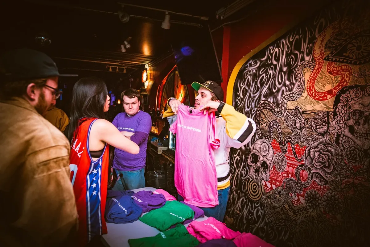 Selling merch at the Count The Dings live show in Boston