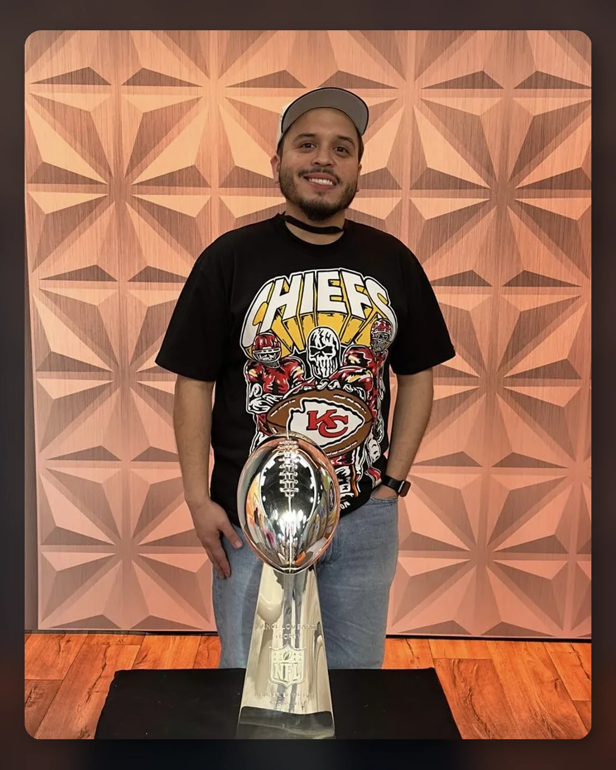 Rob Lopez with the Lombardi Trophy at the Super Bowl